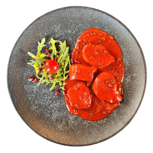 Svinjski file u umaku od crvene paprike i zelenog papra 